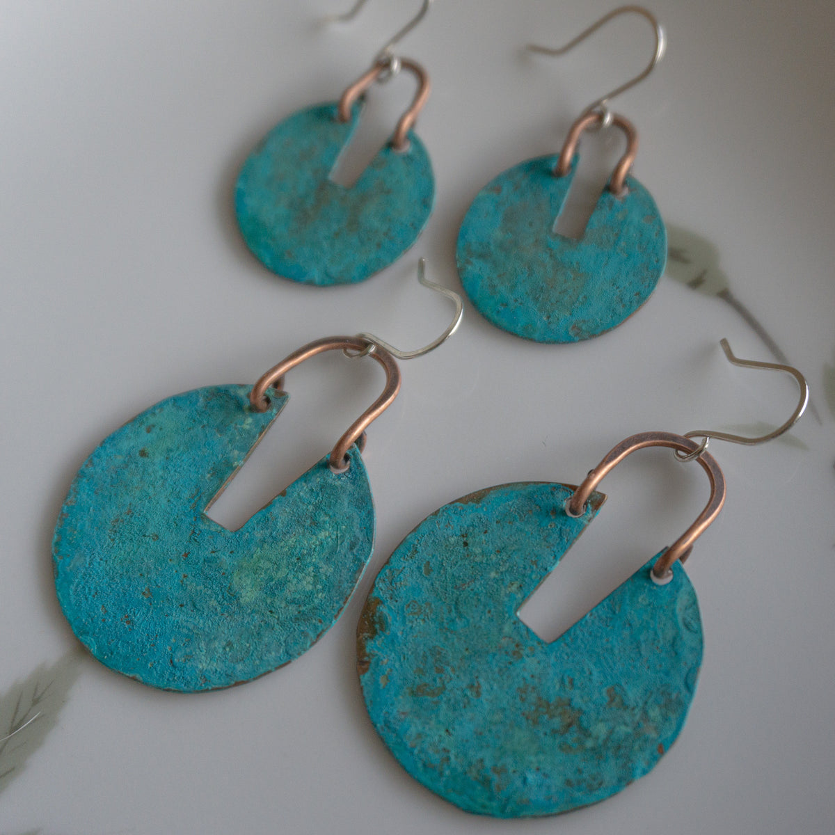 Kinetic Verdigris Sundial Earrings