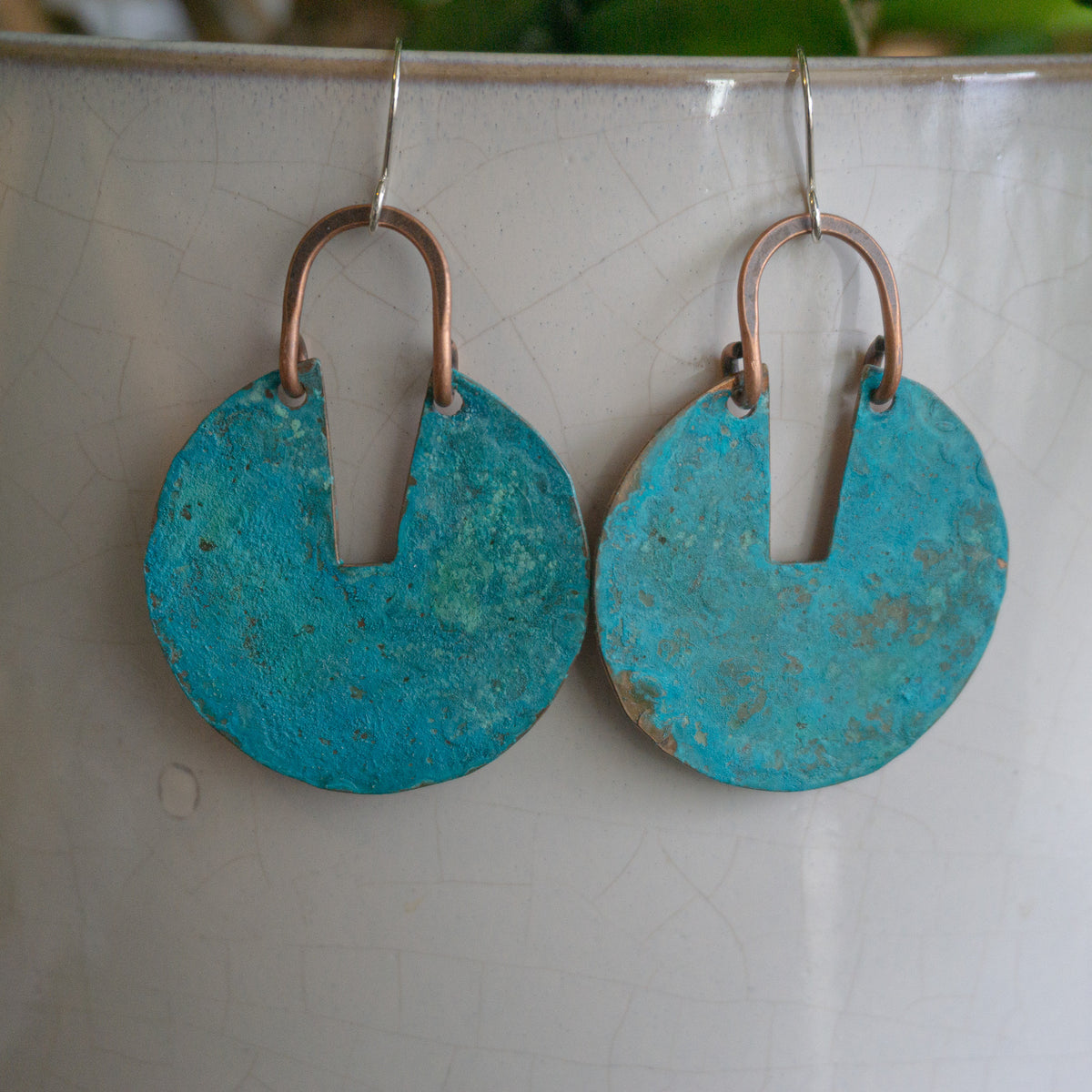 Kinetic Verdigris Sundial Earrings